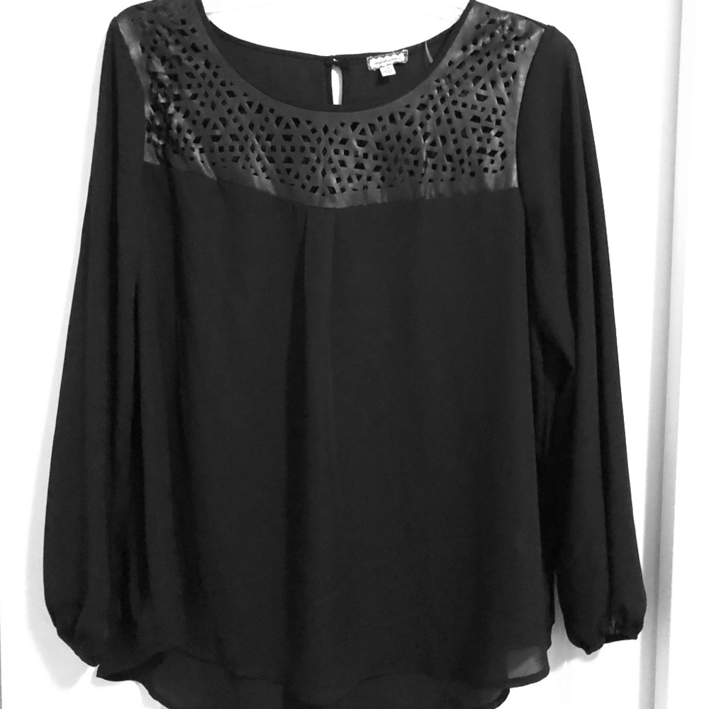 Blouse with faux leather details
